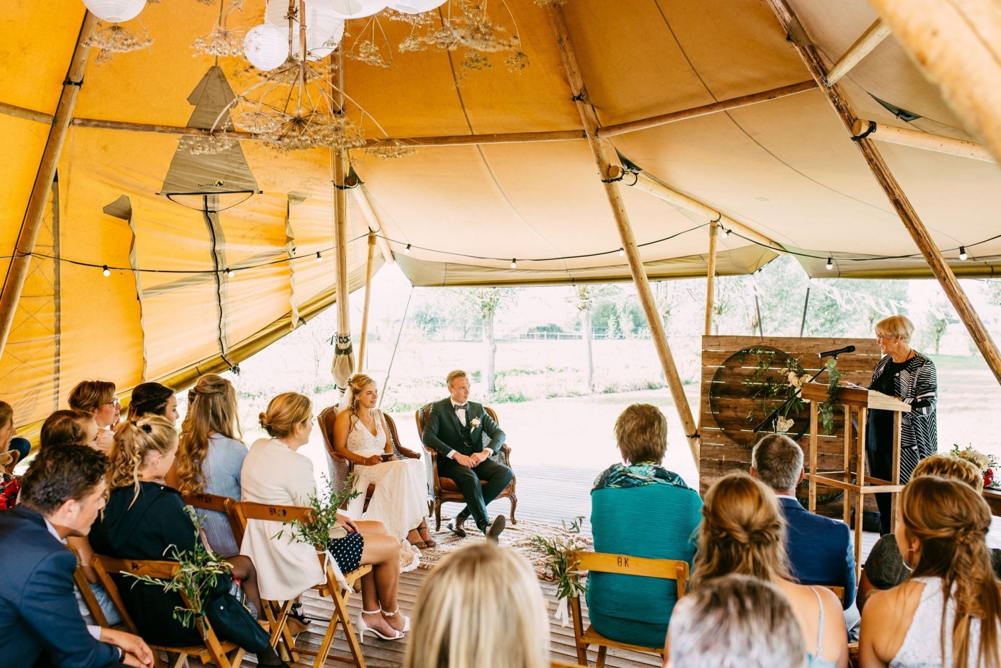 A wedding ceremony in a tipi tent.