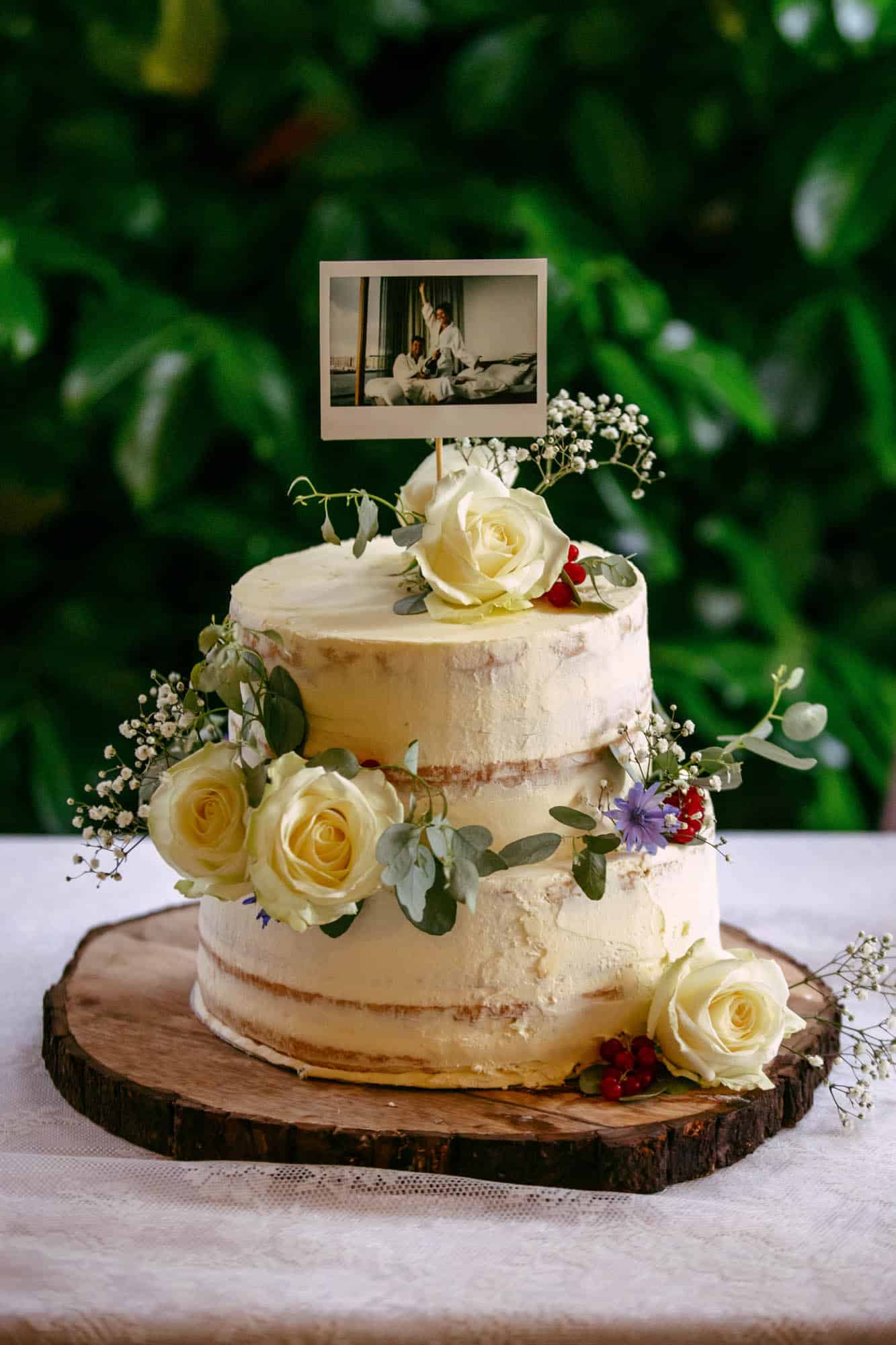 A wedding cake with a picture on it.