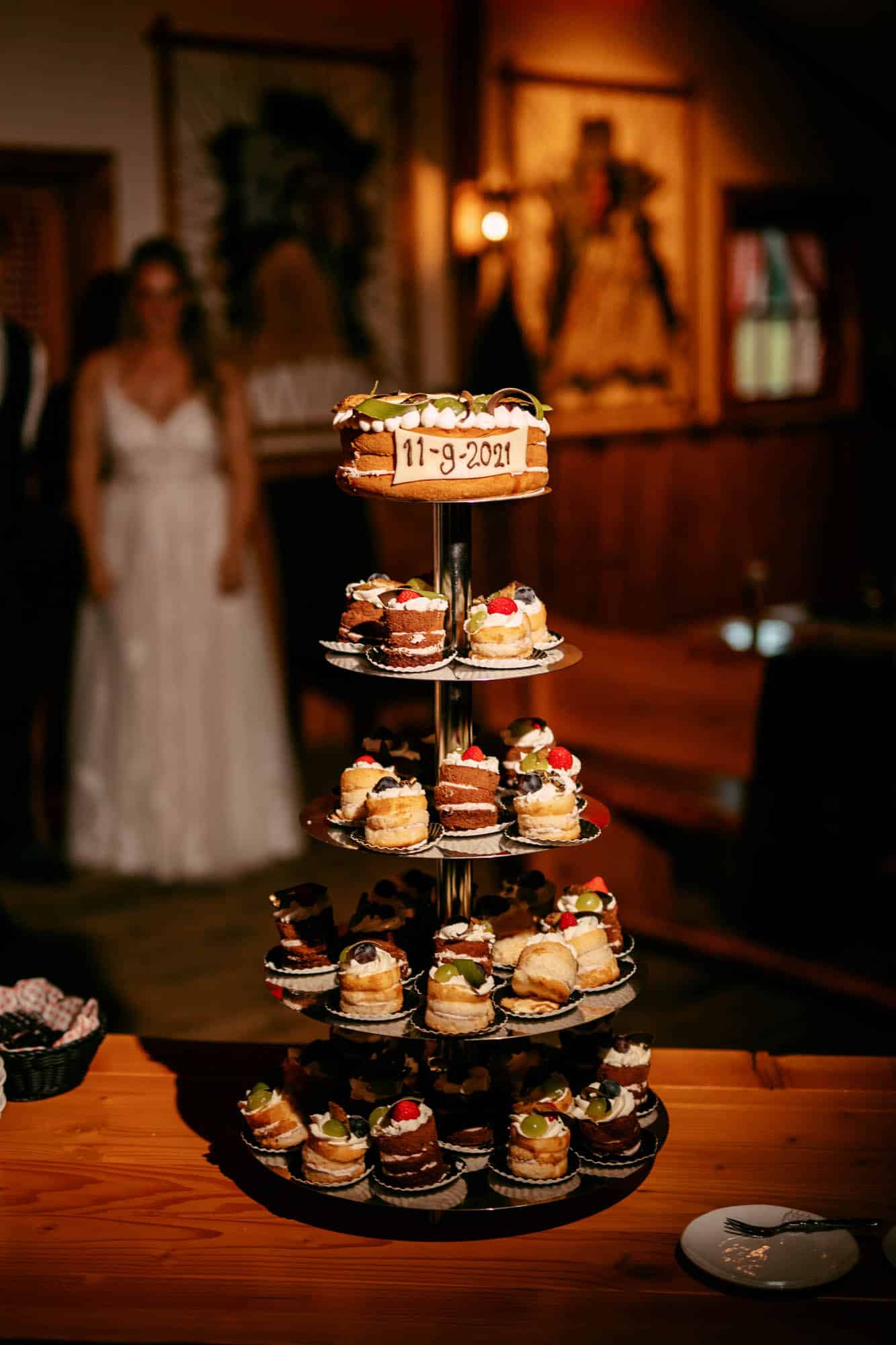Wedding cakes with cupcakes on top
