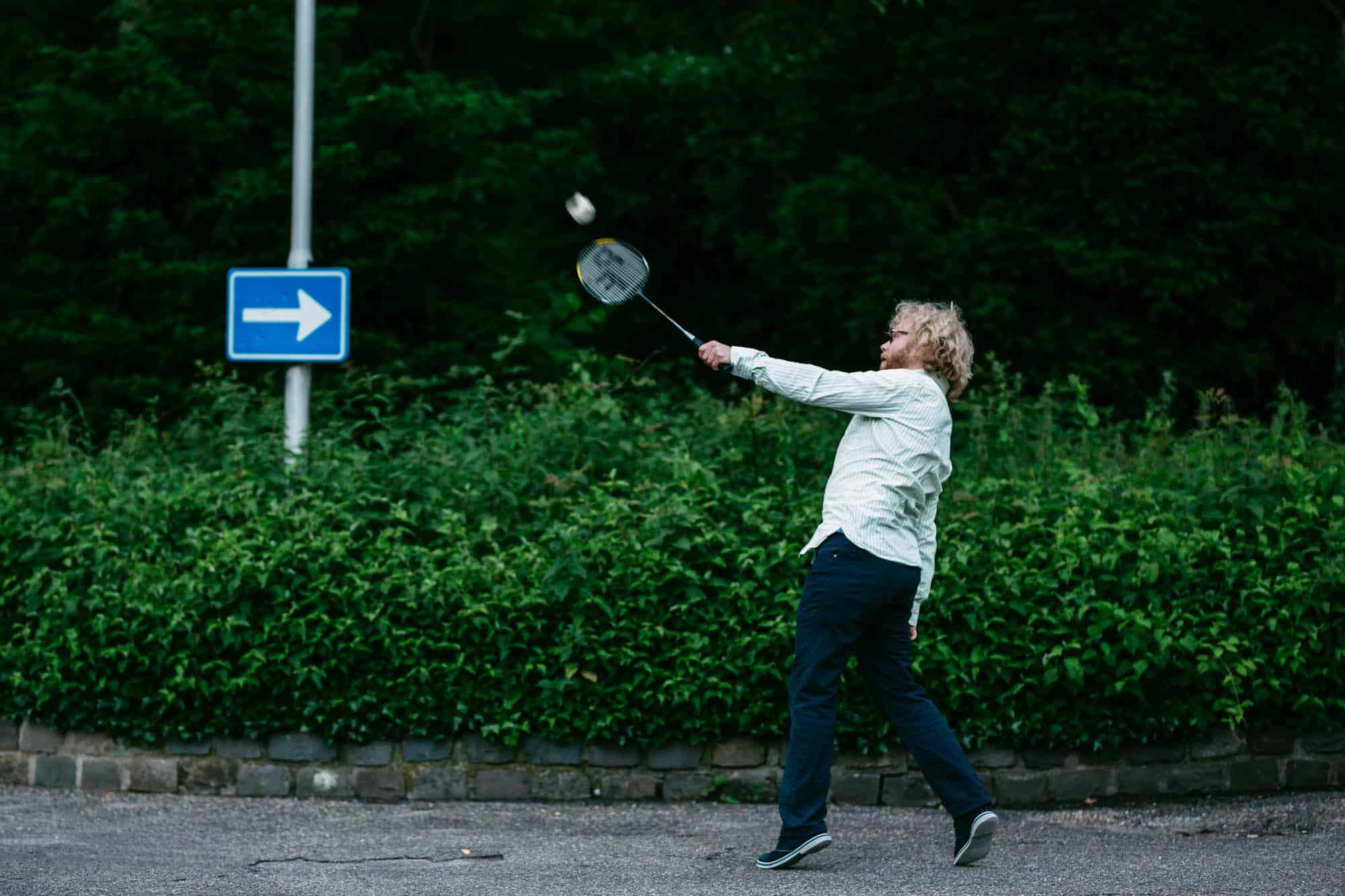 A man playing badminton.