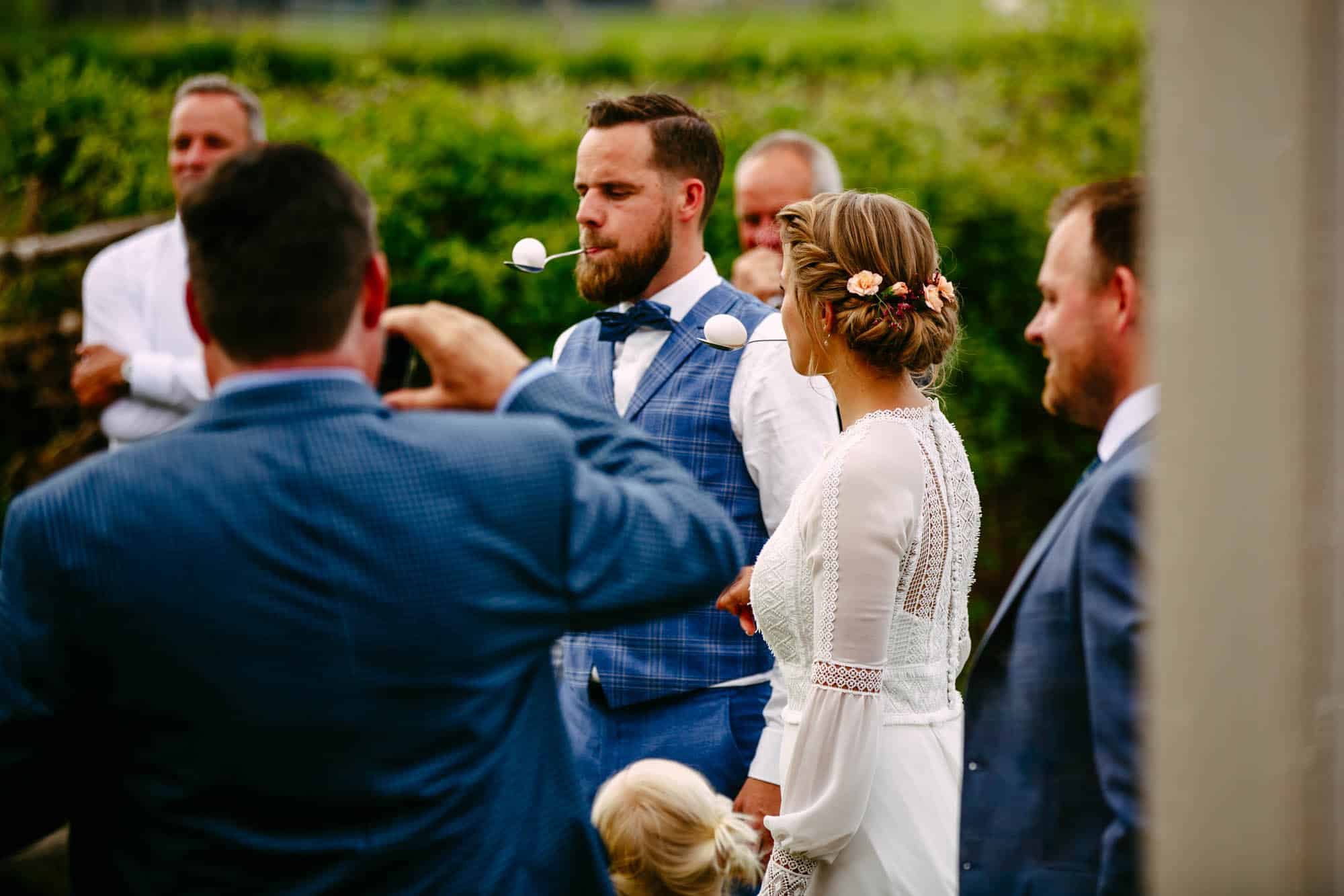 A bride and groom capturing a memorable moment during their wedding.