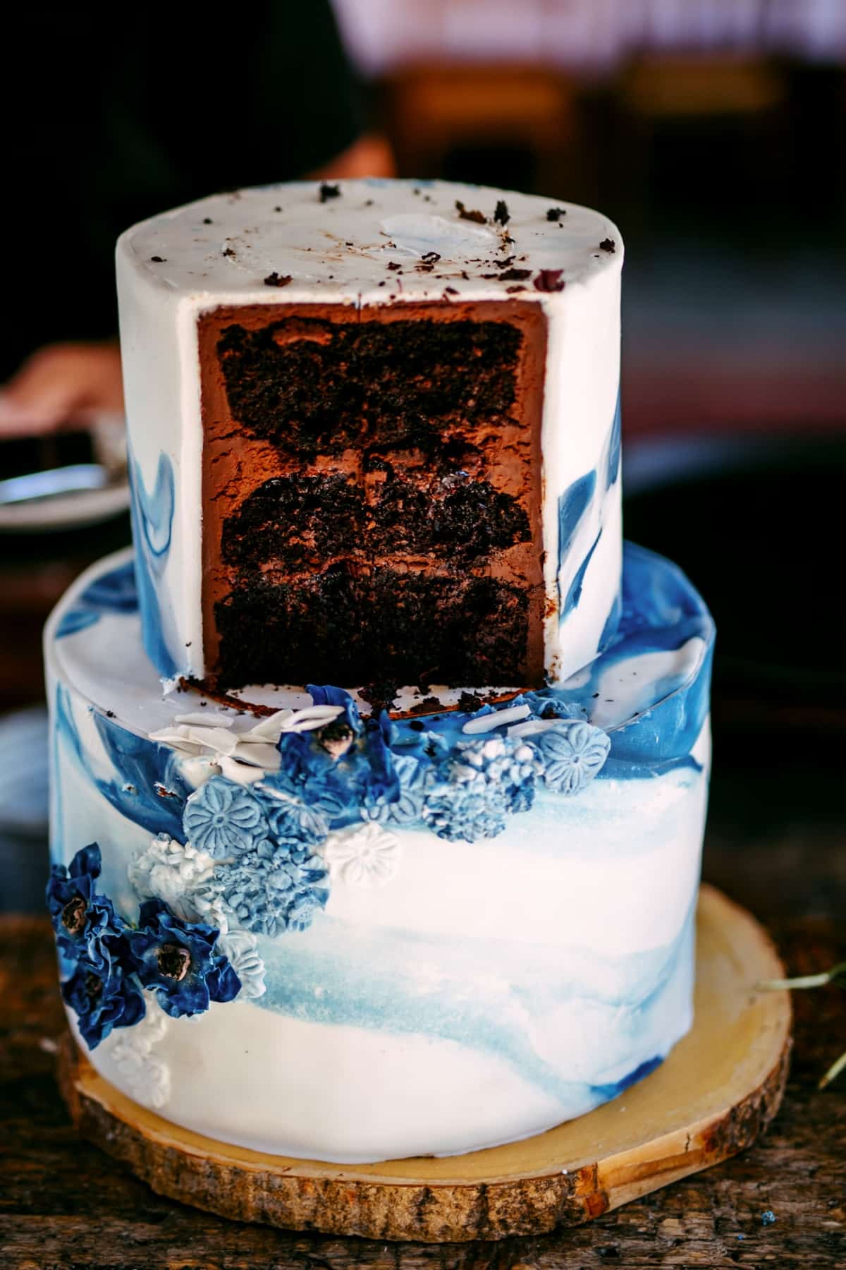 Blue Chocolate wedding cake with flowers