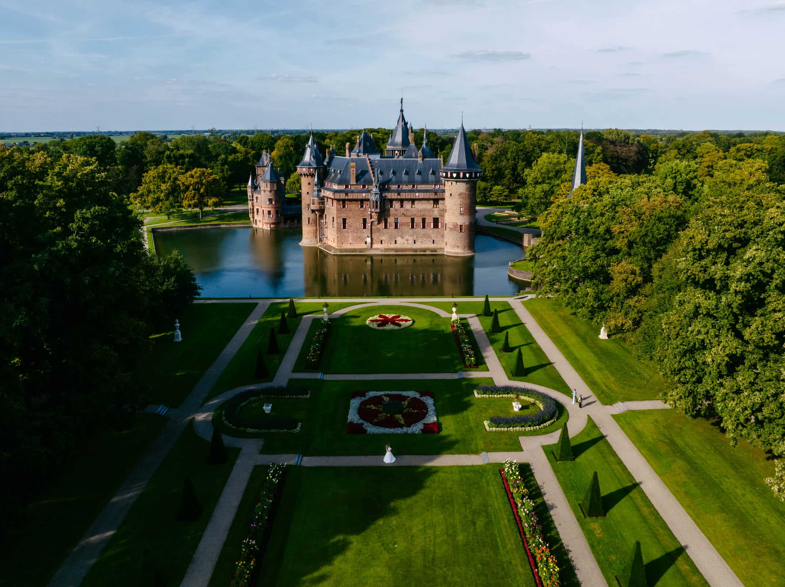 An aerial view of Castle de Haar, a castle surrounded by trees.