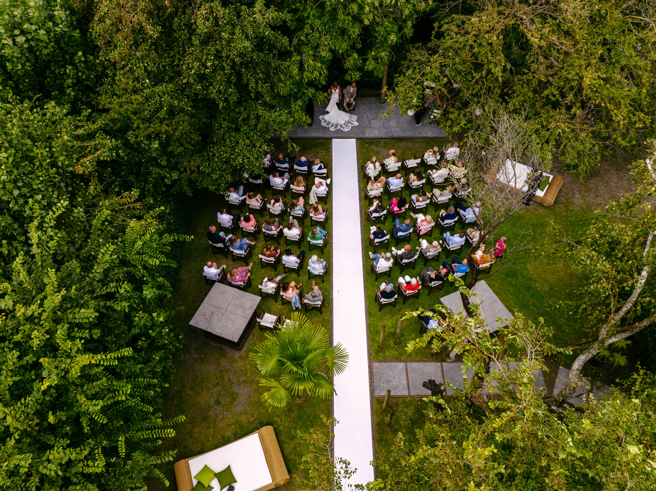 An aerial view of a wedding ceremony at De Viersprong in S Gravenzande in the middle of the forest.