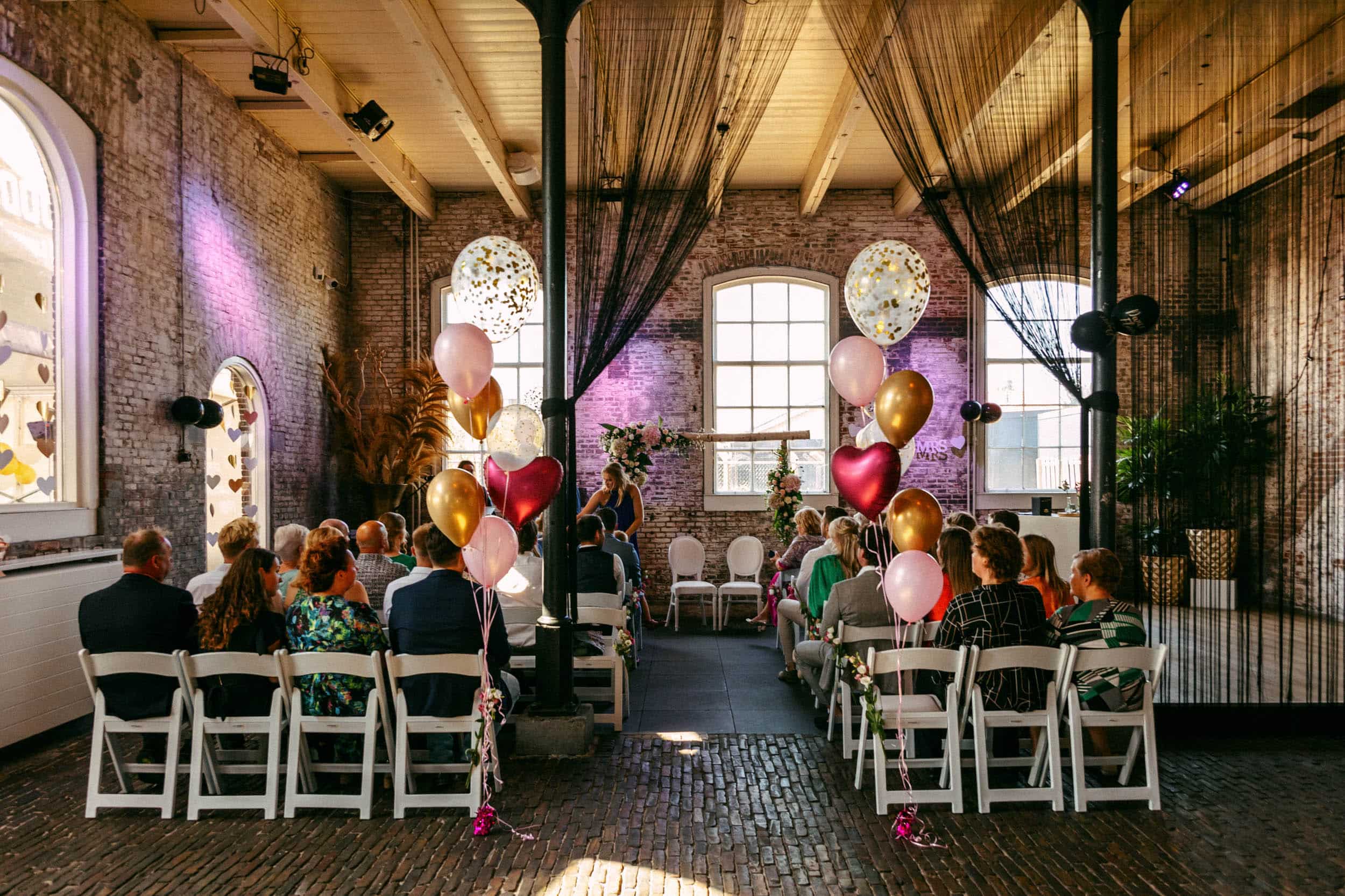 My torpedo shed, a wedding ceremony with balloons.