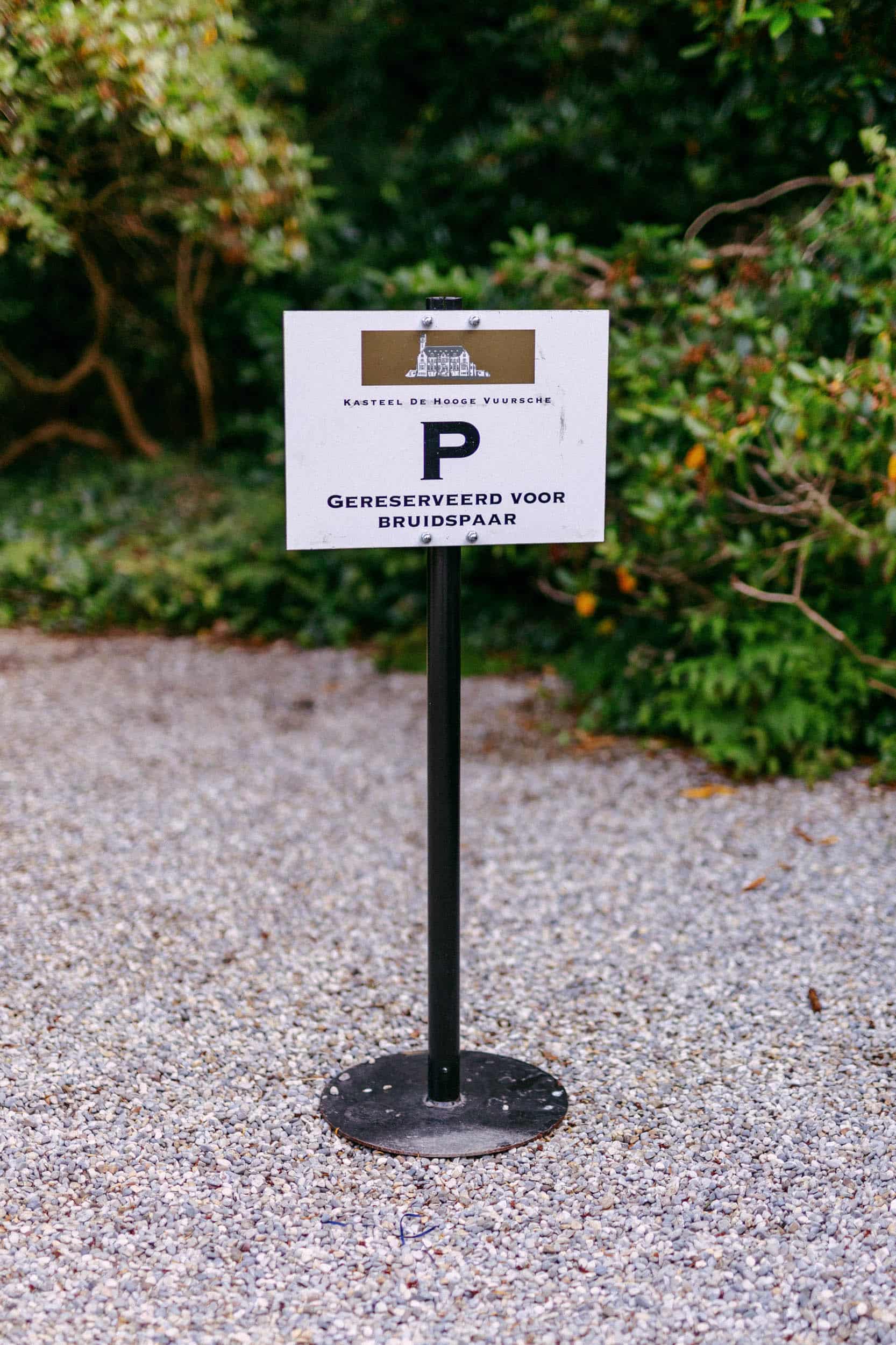 A parking sign for bushes.